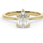 yellow gold pear moissanite engagement ring