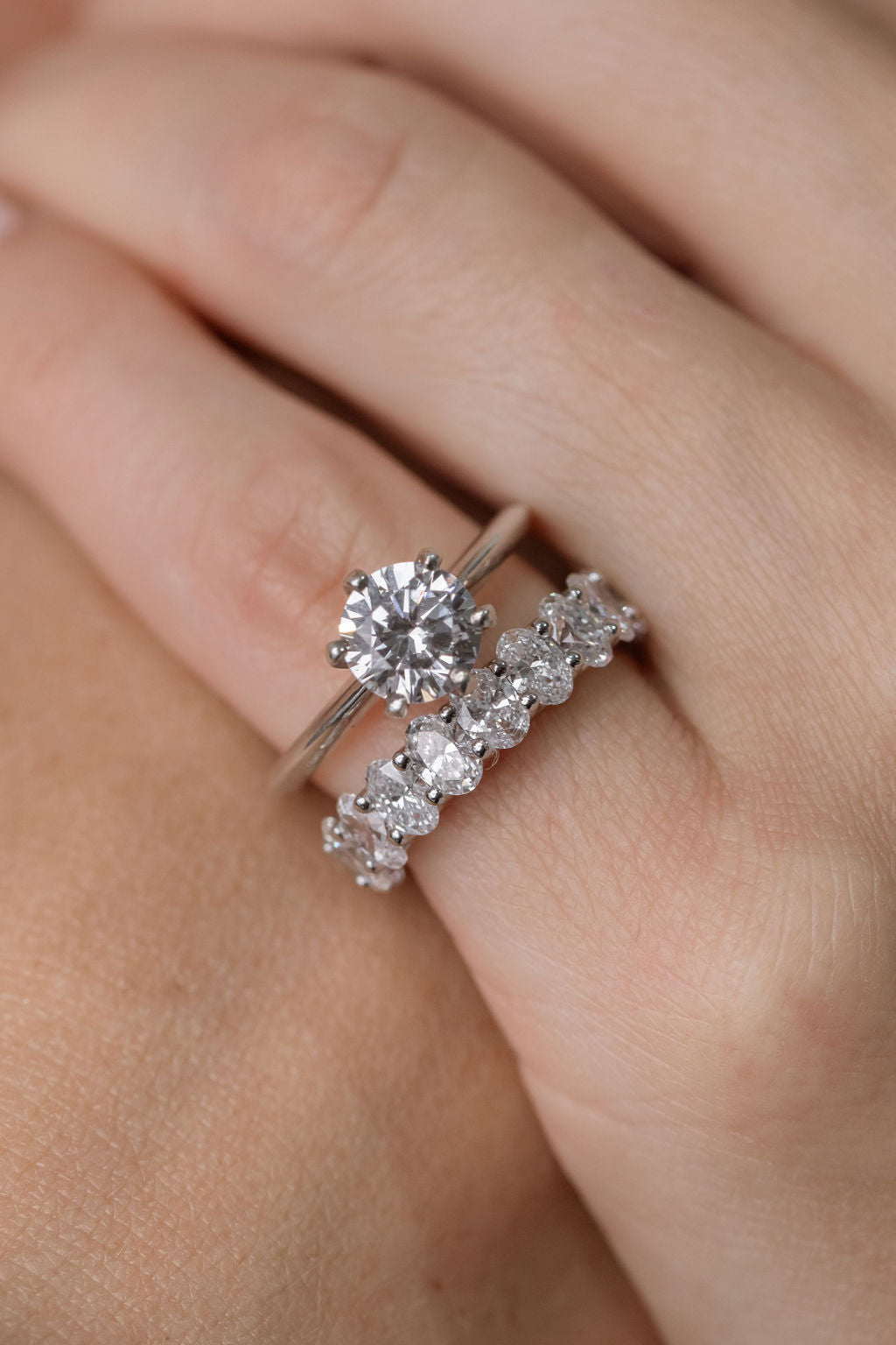 platinum solitaire engagement ring with oval diamond wedding ring