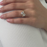 Toi et moi engagement ring with large oval cut diamond and large pear cut diamond