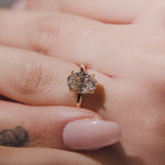 oval with hidden halo engagement ring
