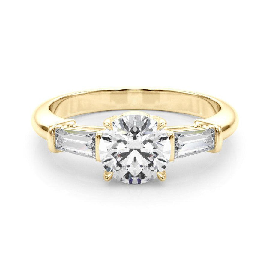 Rachel - a 3 stone with a round centre stone and tapered baguette side stones