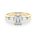 three stone engagement ring with moissanite emerald cut moissanite centre stone and baguette cut moissanite side stones