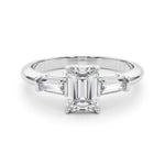 three stone engagement ring with moissanite emerald cut moissanite centre stone and baguette cut moissanite side stones