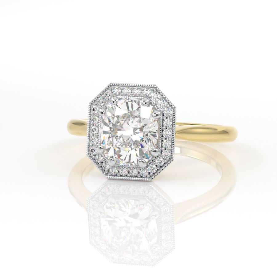 Halo engagement ring with an elongated cushion cut centre stone, diamond halo and millgrain edge