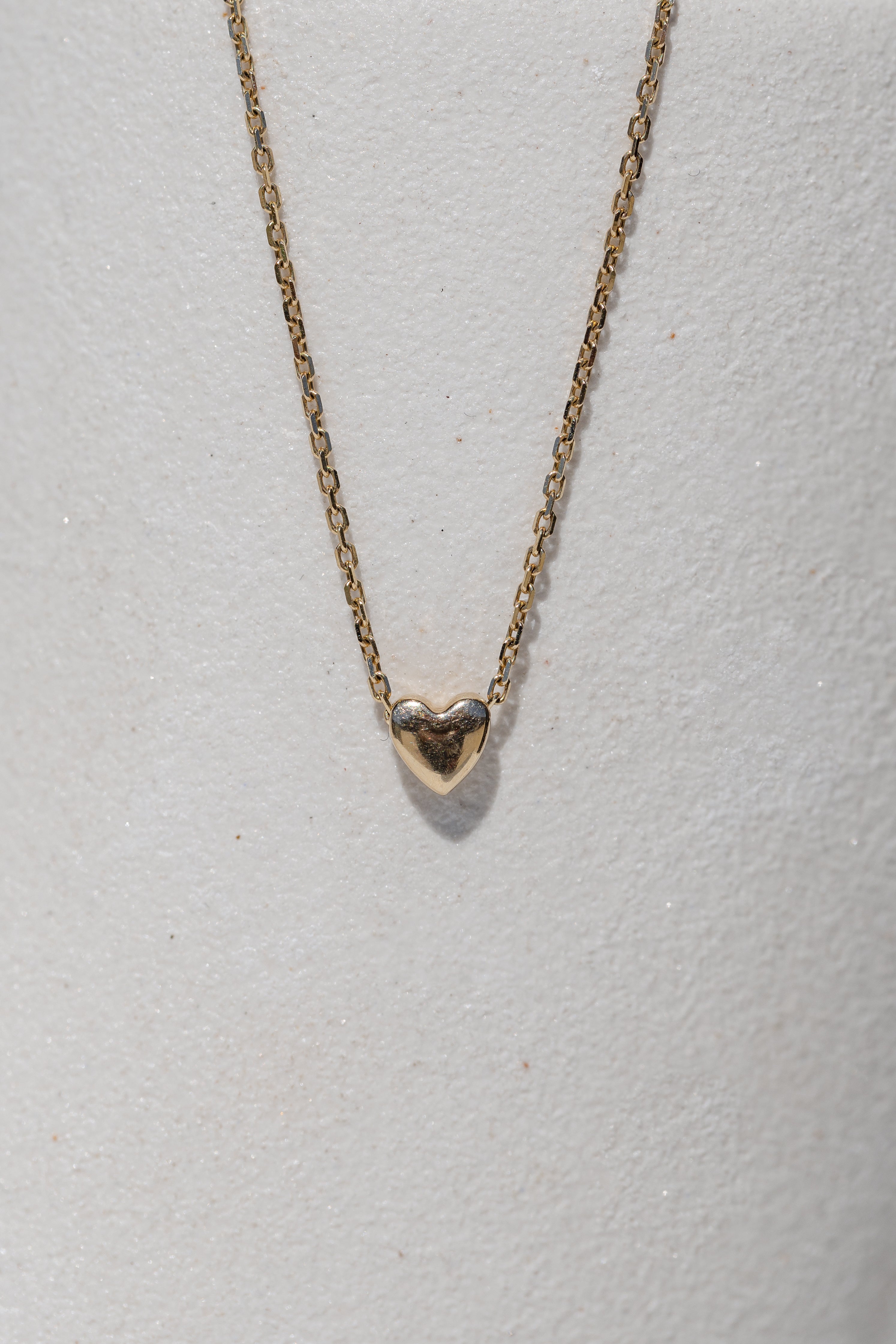 solid gold or silver tiny heart pendants