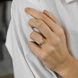 Yellow gold round solitaire engagement ring with classic yellow gold wedding ring