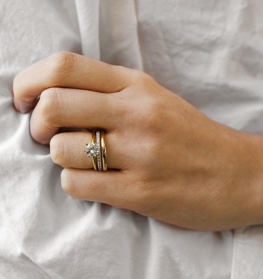 yellow gold round solitaire engagement ring with diamond ring and classic yellow gold wedding ring