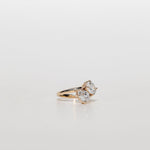 toi et moi diamond engagement ring with pear cut diamond and oval cut diamond
