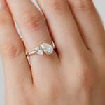 toi et moi pear cut diamond engagement ring