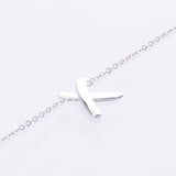 white gold x bracelet