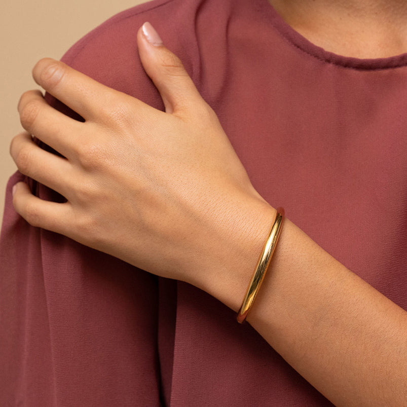 yellow gold dome bangle