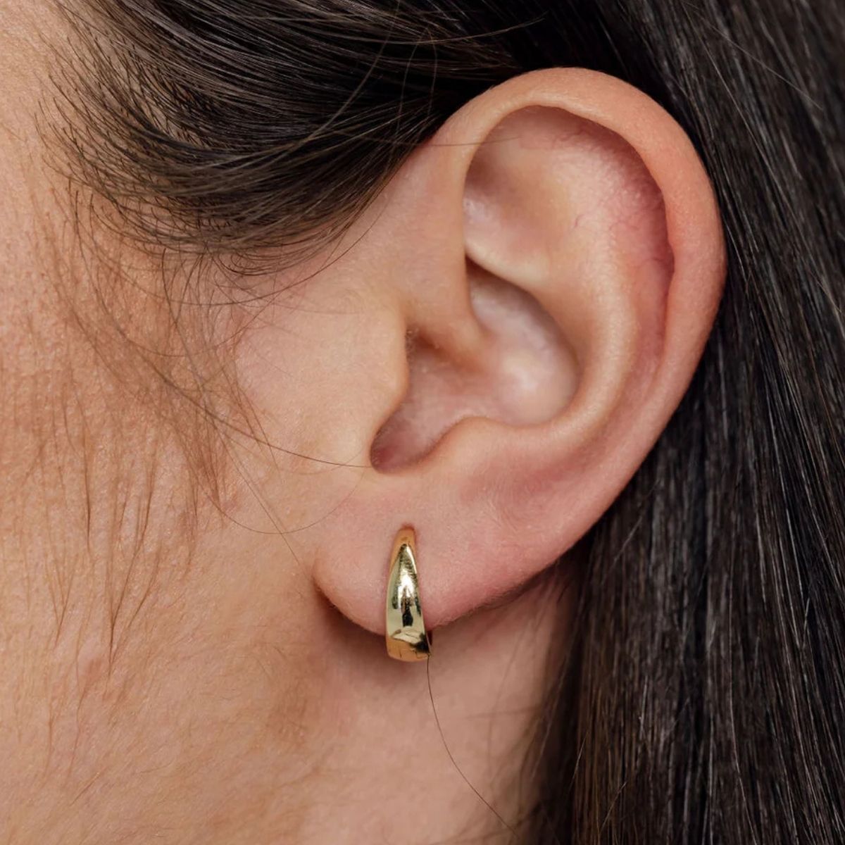 Diamond huggie earrings adding minimal sparkle for contemporary Adelaide style
