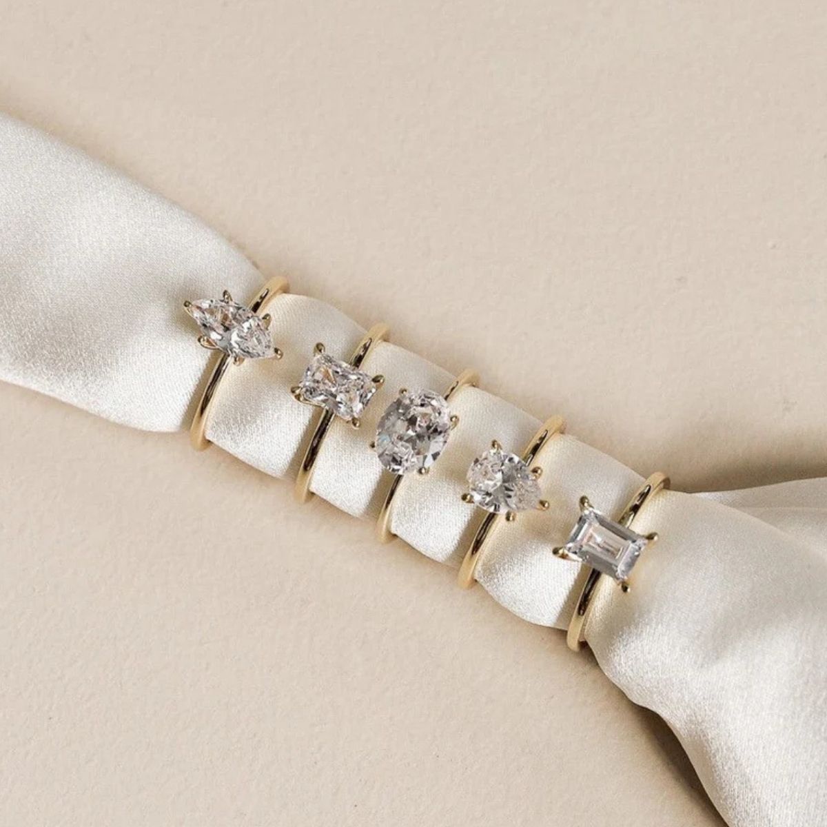 Handcrafted engagement ring collection featuring various diamond shapes and settings Adelaide