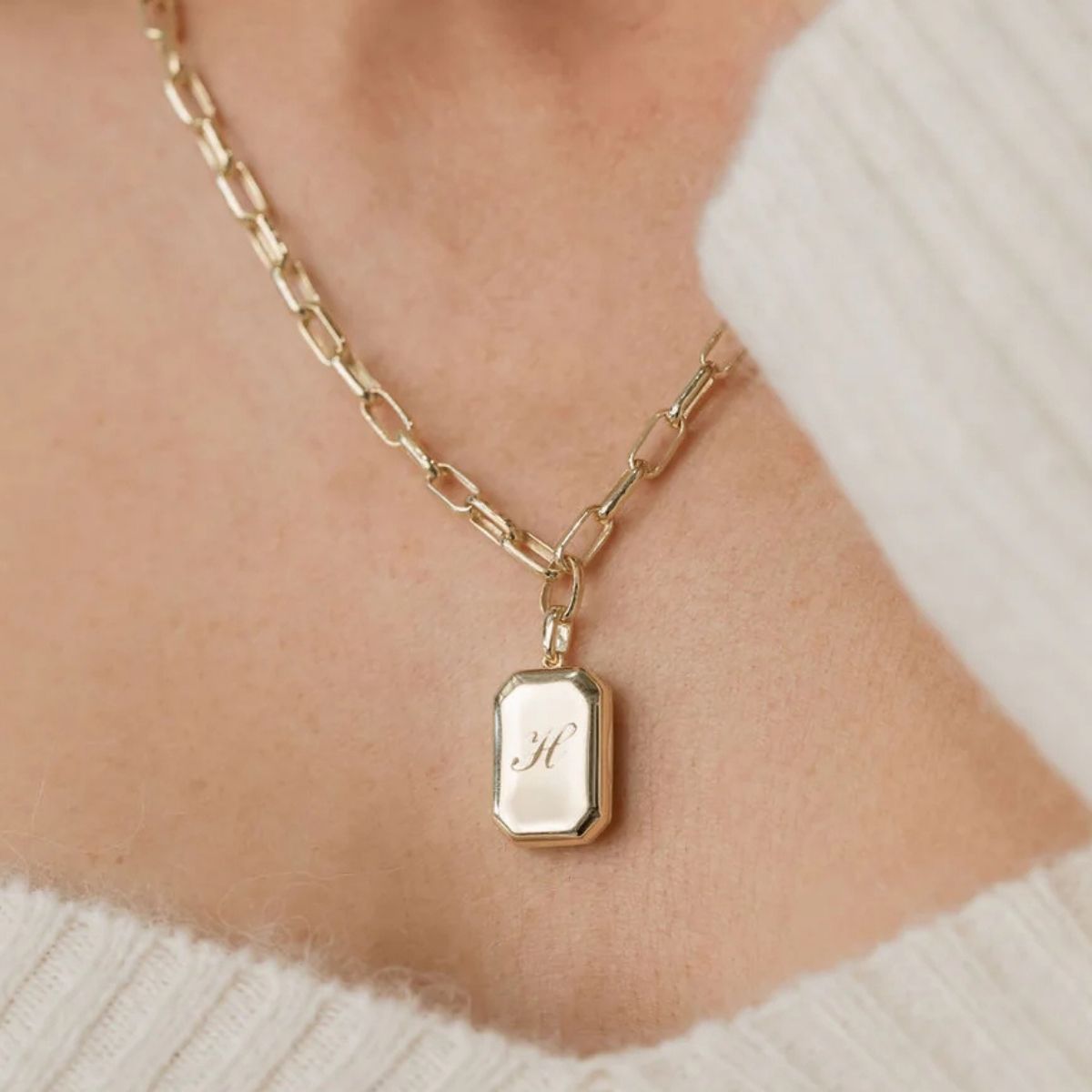 Contemporary gold pendant necklace collection featuring geometric and organic designs Adelaide