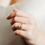 3 claw diamond wedding ring with emerald cut solitaire engagement ring 