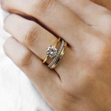 yellow gold round solitaire engagement ring with white gold diamond ring and yellow gold wedding ring