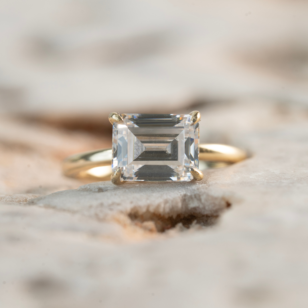 Emerald Cut Diamond Solitaire Engagement Ring set East-West
