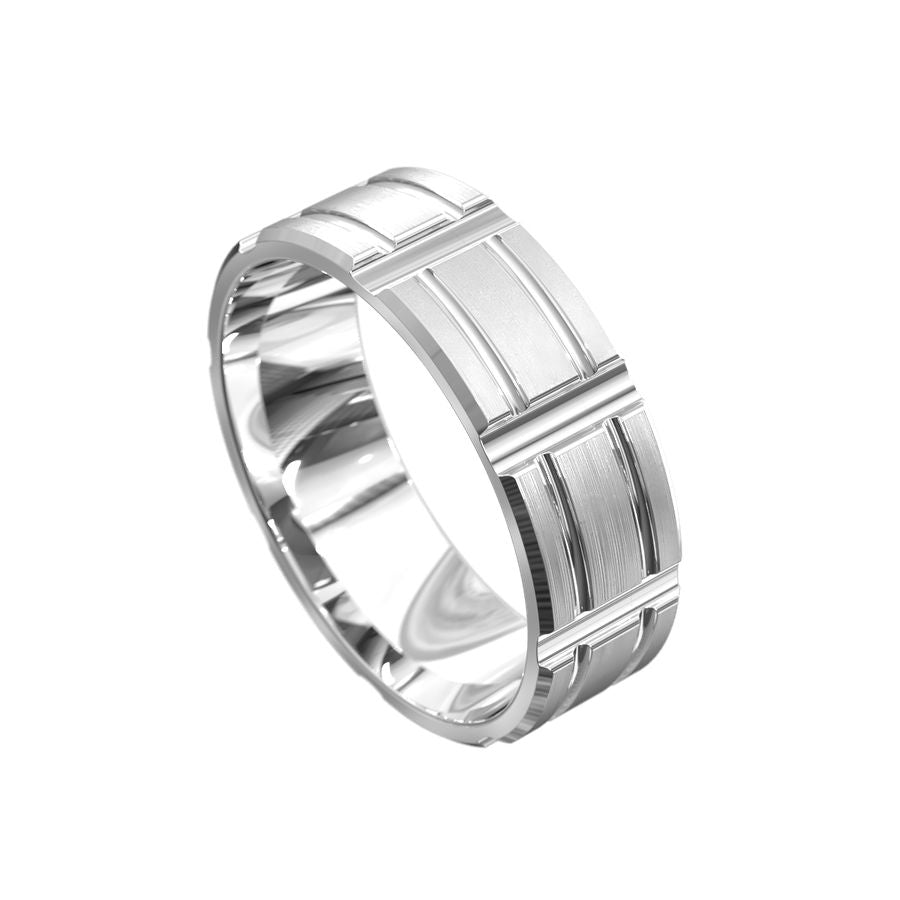 A brushed white gold men's wedding band with handcarved line detailing.