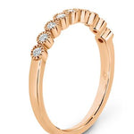 Bezel set diamonds with delicate millgrain edging eternity ring in rose gold 
