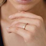 Bezel set emerald cut statement diamond wedding ring