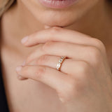 Bezel set emerald cut statement diamond wedding ring