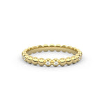 Bubble and sparkle A gold ring with round diamond accents set within a bubble like design