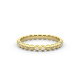 Bubble and sparkle A gold ring with round diamond accents set within a bubble like design
