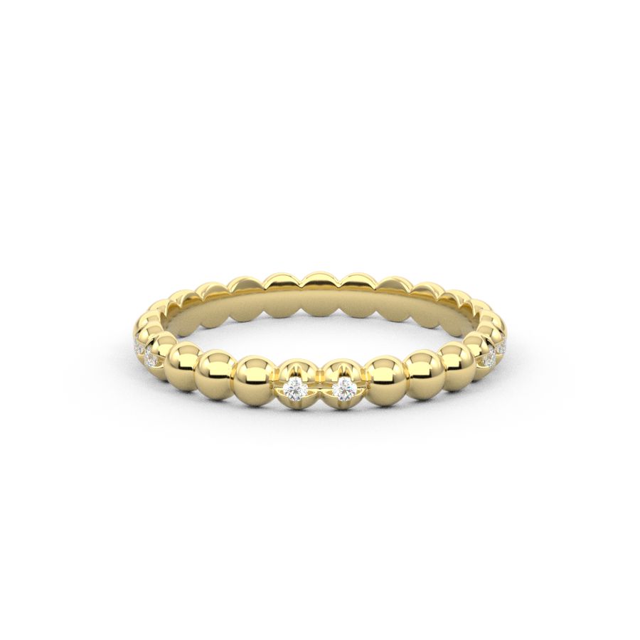 Bubble and sparkle A gold ring with round diamond accents set within a bubble like design