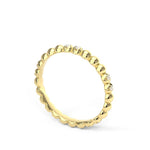 Bubble and sparkle A gold ring with round diamond accents set within a bubble like design 3