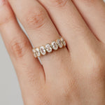 Celine Oval Bezel set wedding ring in yellow gold 
