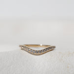 Curved diamond eternal wedding band 