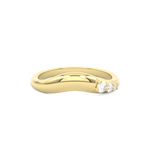 Curved wedding band with diamond accent stones