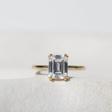 DOUBLE CLAW EMERALD CUT SOLITAIRE ENGAGEMENT RING