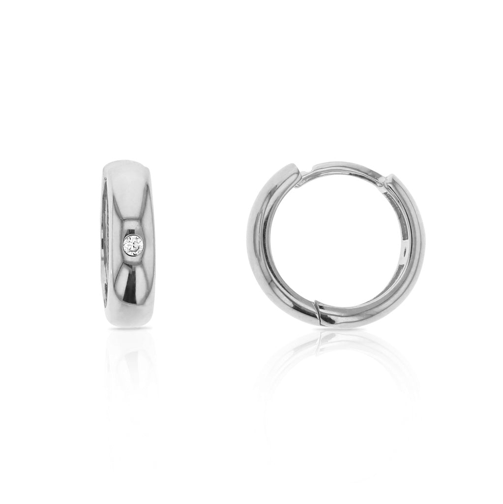 Huggie earrings with pressure set diamond