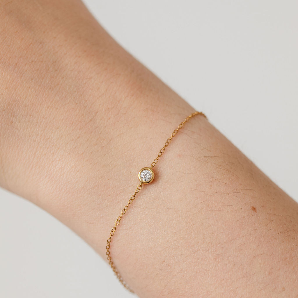 Diamond bezel  bracelet yellow gold 
