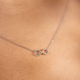 Diamond infinity necklace white gold
