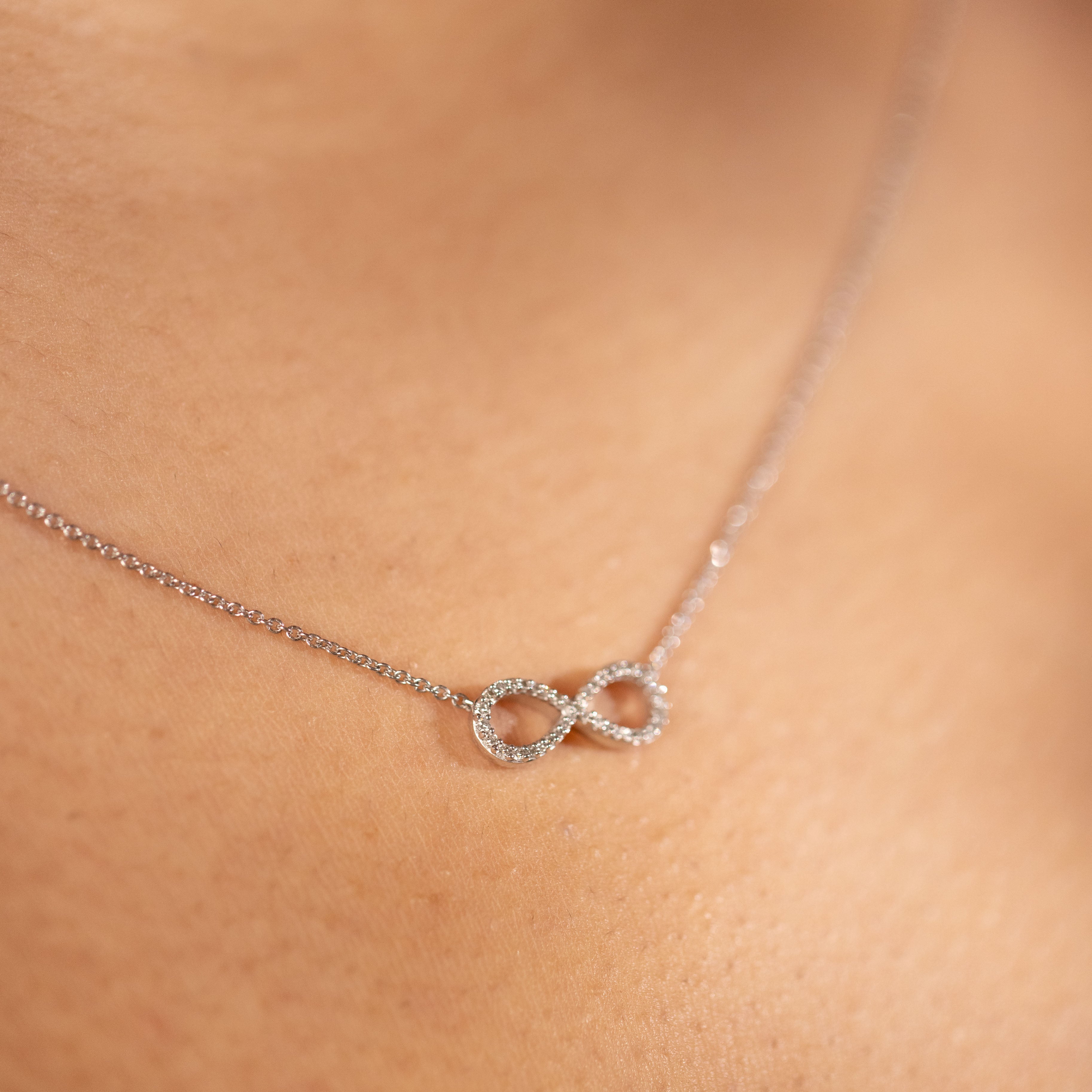 Diamond infinity necklace white gold