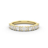 Diamond statement wedding ring with princess cut and baguette cut diamonds in 18kt yellow gold 