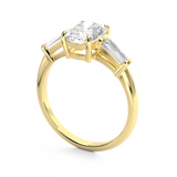 Elongated Cushion Cut 3 stone Diamond engagement ring with tapered baguette side stones