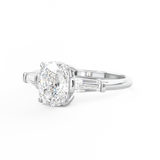 Elongated Cushion Cut 3 stone Diamond engagement ring with tapered baguette side stones in platinum