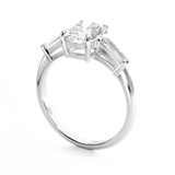 Elongated Cushion Cut 3 stone Diamond engagement ring with tapered baguette side stones in white gold