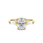 Elongated Cushion Cut 3 stone Diamond engagement ring with tapered baguette side stones in yellow gold