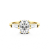 Elongated Cushion Cut 3 stone Diamond engagement ring with tapered baguette side stones in yellow gold