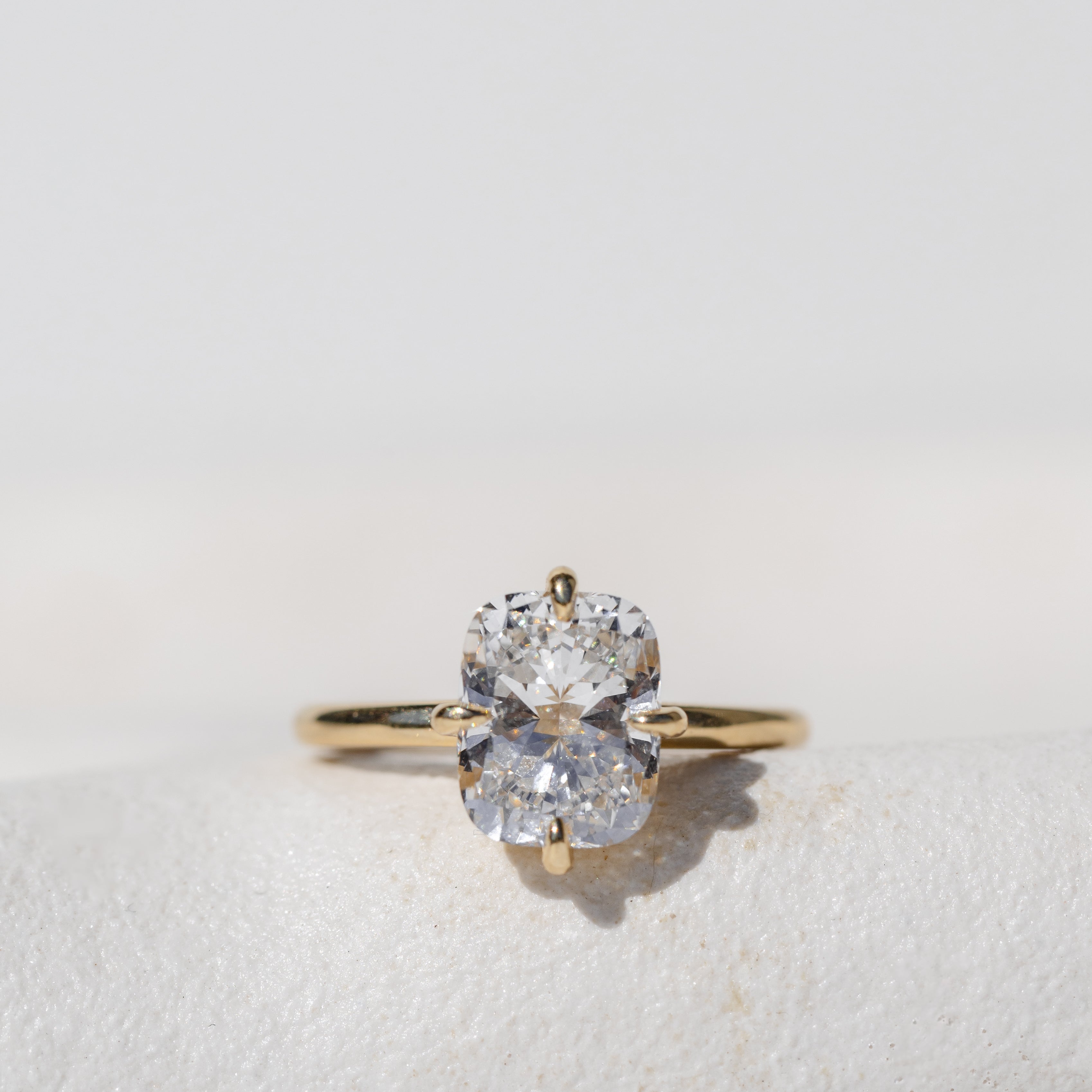 Elongated Cushion Cut Engagement Ring Compass Setting