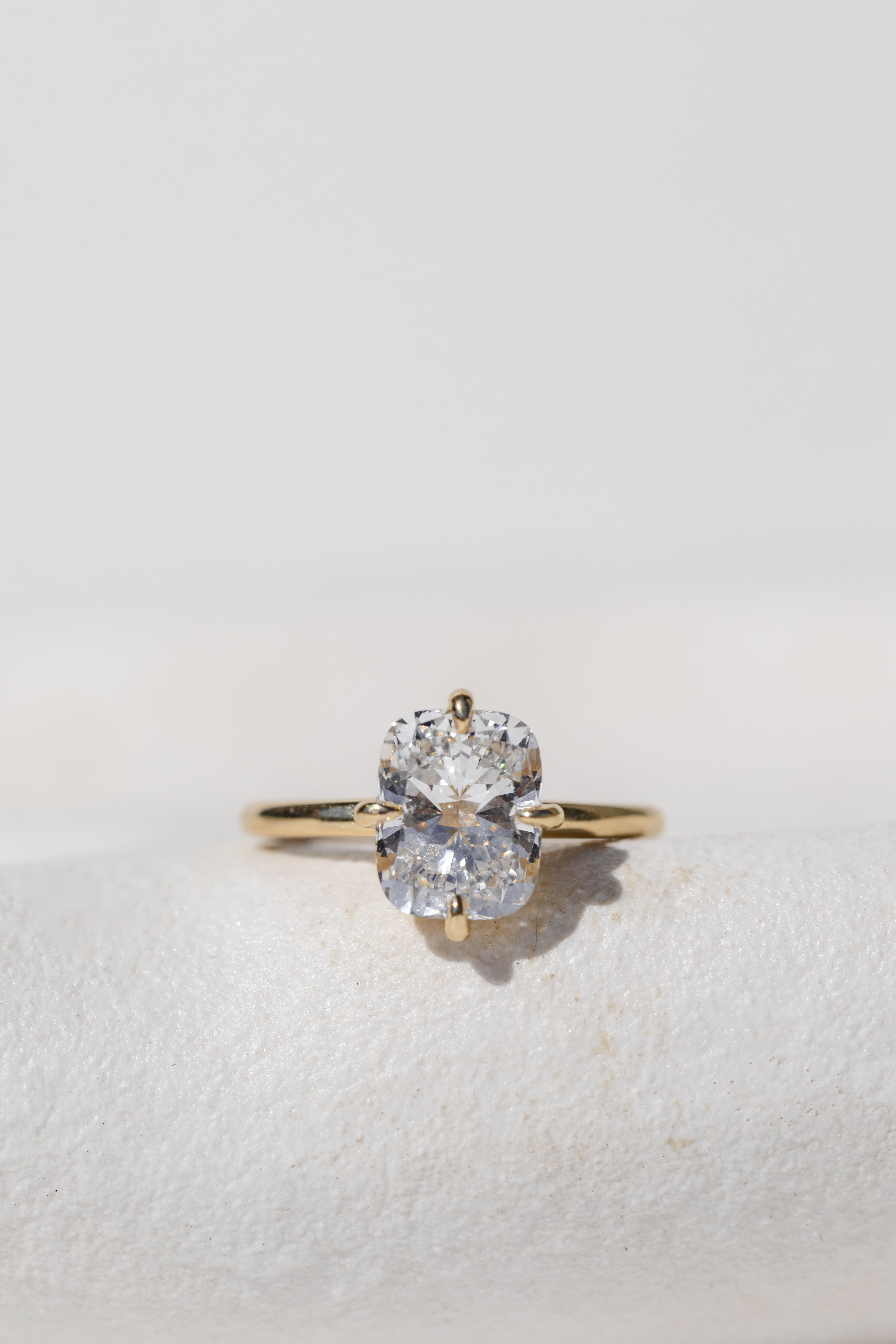 Elongated Cushion Cut Engagement Ring Compass Setting