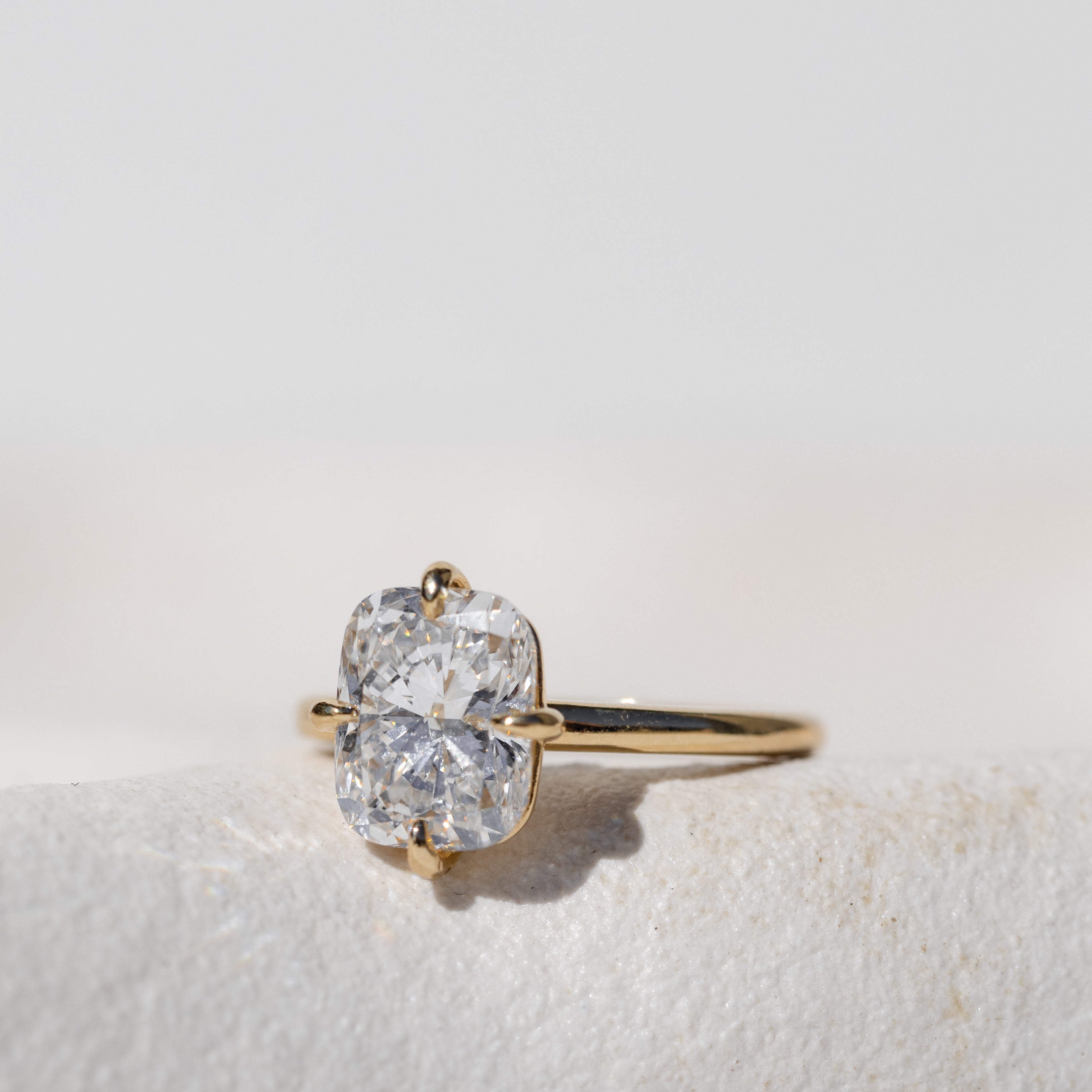 Elongated Cushion Cut Solitaire Engagement Ring Compass Setting