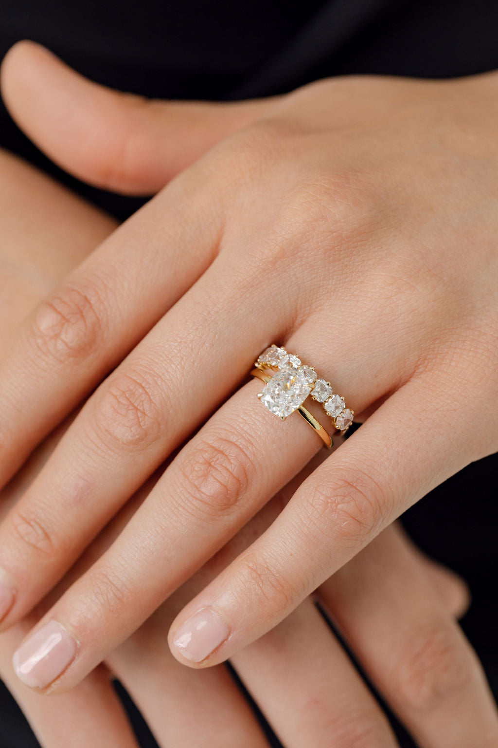 Elongated cushion cut diamond solitaire engagement ring with asscher cut diamond wedding ring