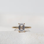 Emerald Cut Diamond Solitaire with Hidden Halo