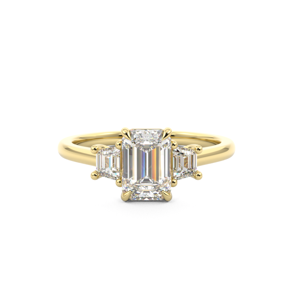 Emerald Cut three stone engagement ring with trapezoid side stones Harry & Co