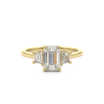 Emerald Cut three stone engagement ring with trapezoid side stones Harry & Co